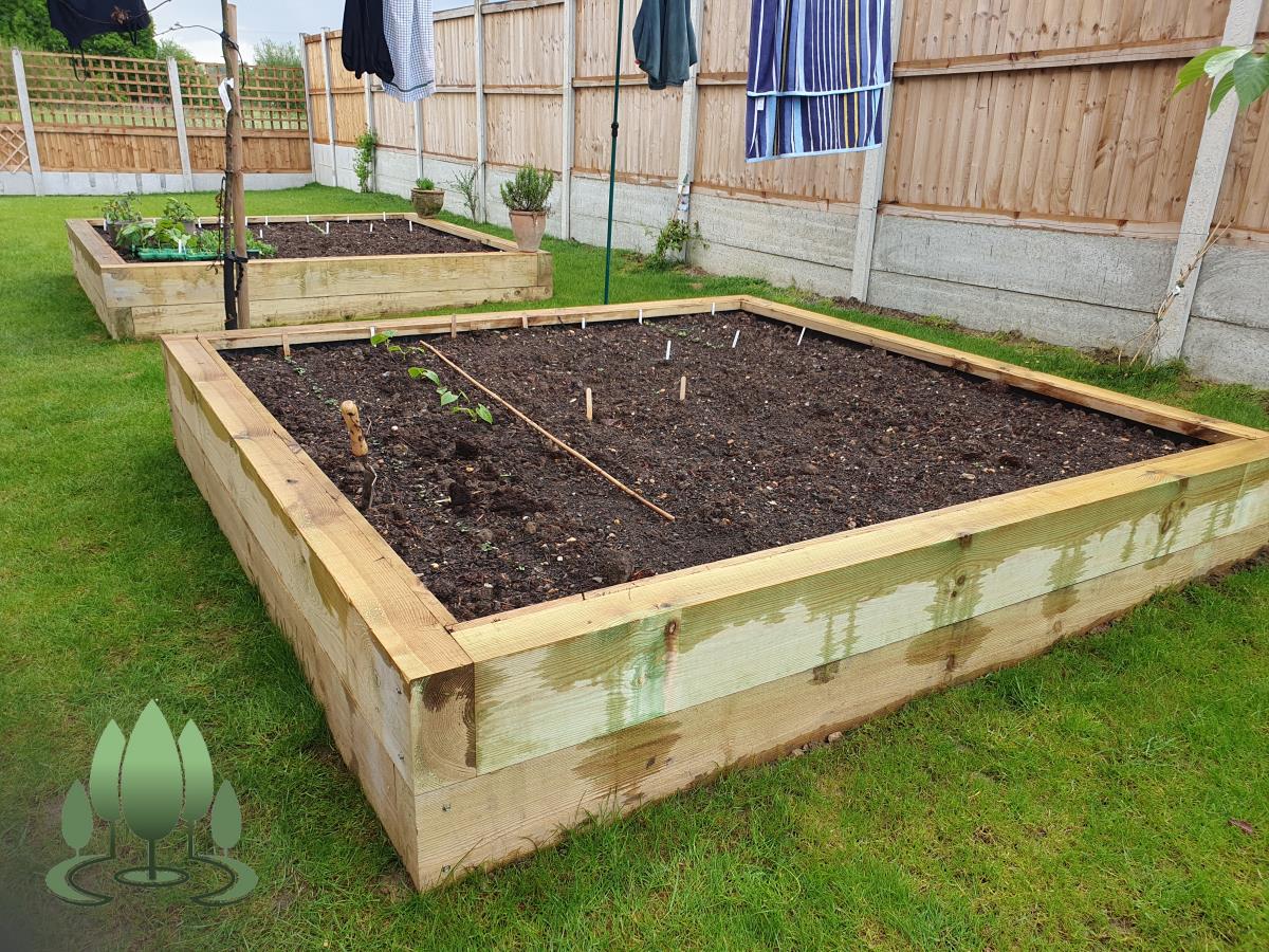 Installation of a new fence built from concrete posts, concrete gravel boards and close board feather edge fence panels.