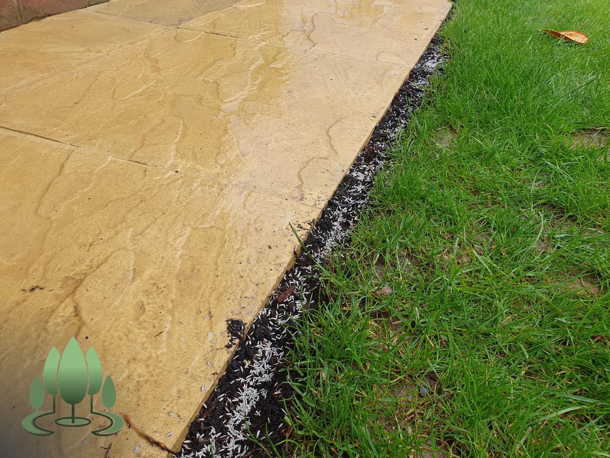 Installation of a new fence built from concrete posts, concrete gravel boards and close board feather edge fence panels.