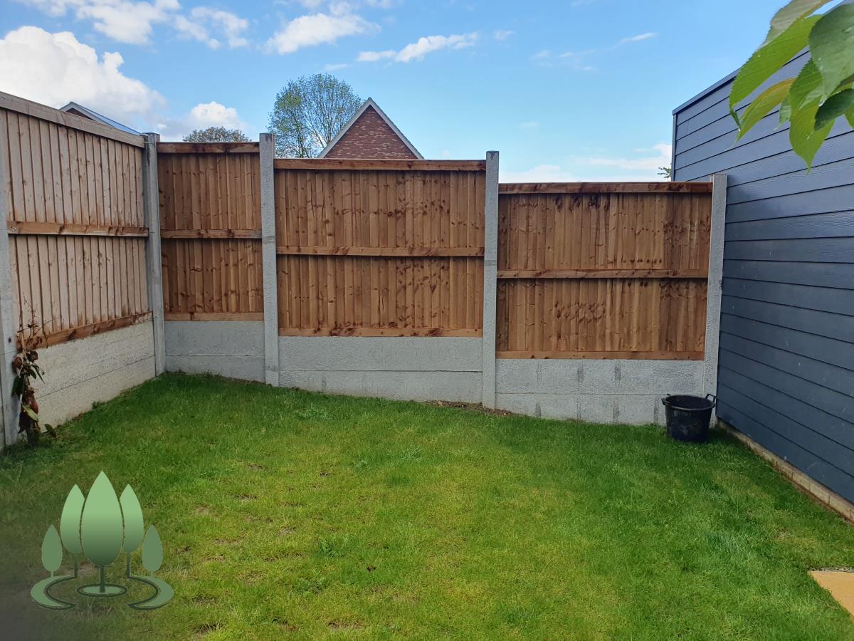 Installation of a new fence built from concrete posts, concrete gravel boards and close board feather edge fence panels.