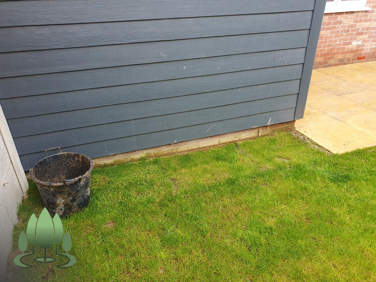 Installation of a new fence built from concrete posts, concrete gravel boards and close board feather edge fence panels.