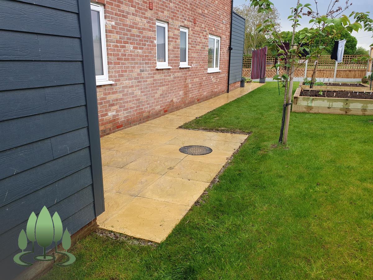 Installation of a new fence built from concrete posts, concrete gravel boards and close board feather edge fence panels.