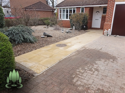 Extension of footpath and driveway repair